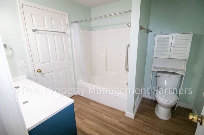 Building Photo - Forest Hills 3 Bed Townhome with Garage, Pond View and Some Utilities Included