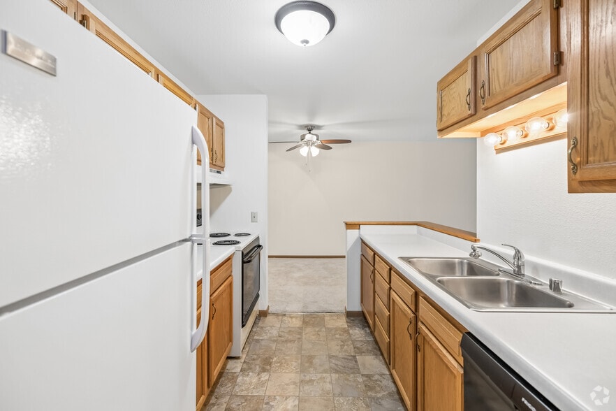 2BR, 1BA - 1,000SF - Kitchen - Westbriar Senior Apartments