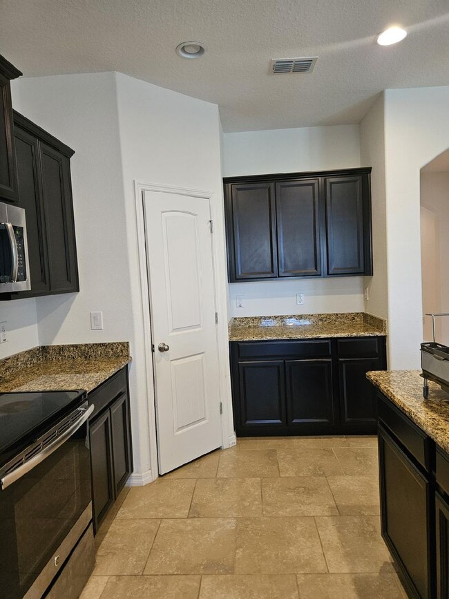 Building Photo - Coming soon!!! BEAUTIFUL 4 BEDROOM 3 BATH ...