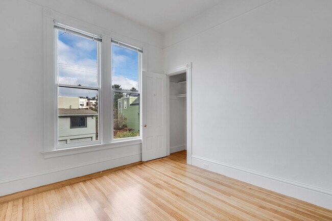 Building Photo - Remodeled pet friendly, top floor 2BR with in-unit laundry