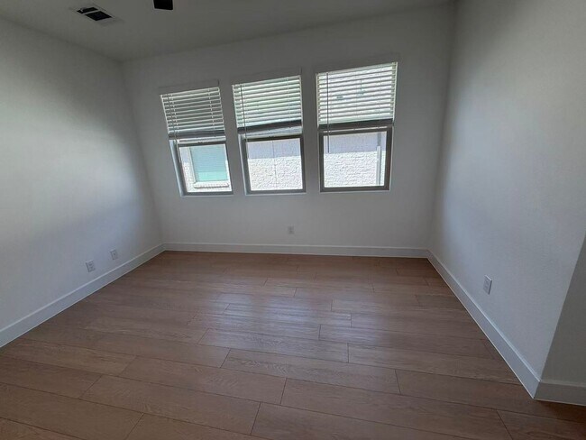 Building Photo - Move-in ready and like-new! Washer, dryer, and refrigerator Included.