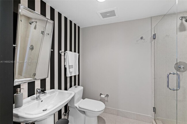 Building Photo - 6899 Collins Ave