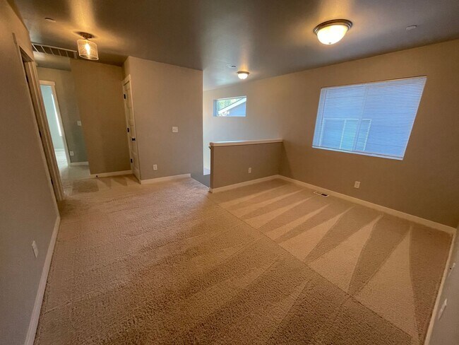 Building Photo - Like New 2022 Built 5 bedroom home