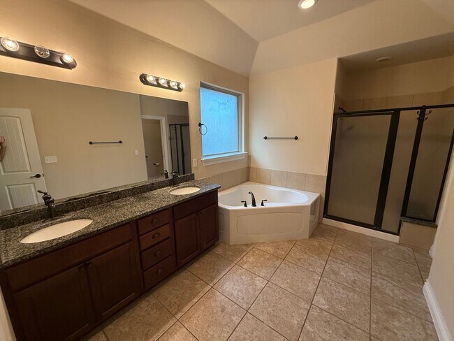 Building Photo - 3 bedroom + office  or 4th bedroom, storm shelter, neighborhood pond and walking track!