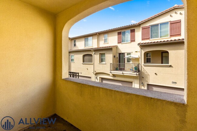 Building Photo - Modern Tri-Level Townhome with Office, 2-Car Garage & Prime Anaheim Location!