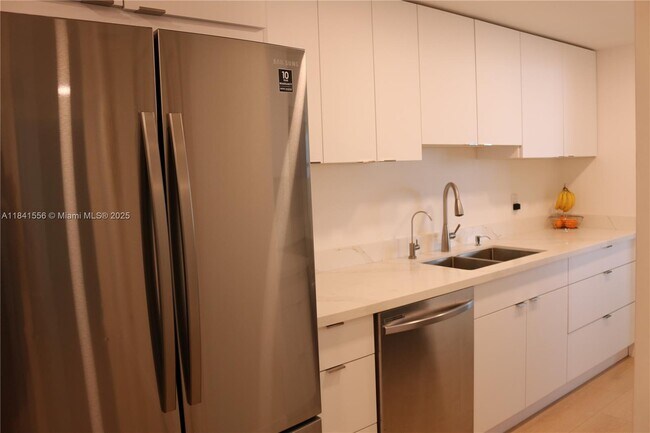 Building Photo - 9801 Collins Ave