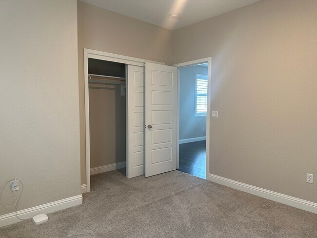 Building Photo - Modern home in a modern community featuring upgraded amities, solar, community pool + Close to Co...