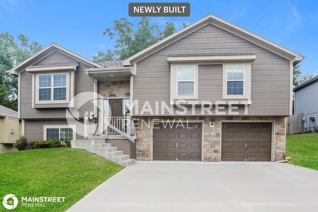 Primary Photo - 411 Wiltshire Dr, Raymore, MO 64083