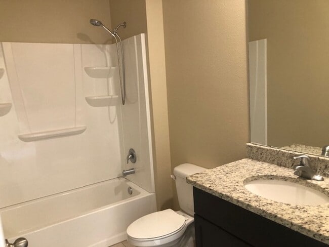 Building Photo - 4/2 with great FENCED in yard and upgraded!