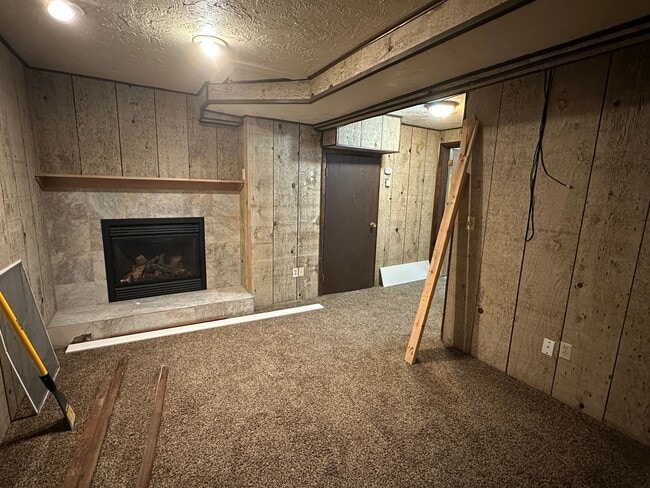 Building Photo - Spacious, three level, 4 Bed 2.5 bath Townhome in Ammon right behind the Walmart on Hitt.