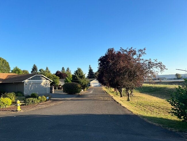 Building Photo - Adorable Quiet park like setting in fruit valley sunsets with landscaping provided