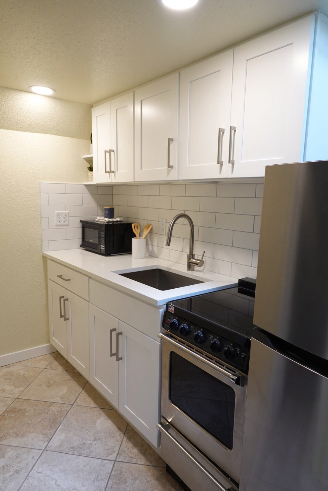 Renovated kitchen with new appliances - 525 NE 86th St