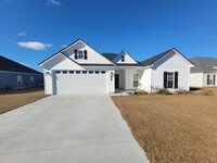 Building Photo - Spacious 4-Bedroom Home with Modern Featur...