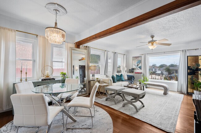 Comfortable living and dining room area. - 1150 W 25th St