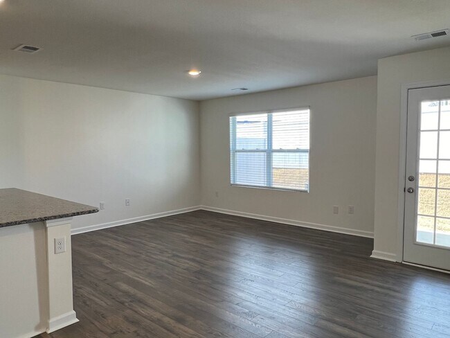 Building Photo - Beautiful New Construction 3 bedroom 2.5 Condo   with garage- Water, trash & sewer incuded!