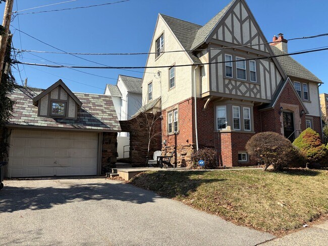 Building Photo - Elegant 3 Story Brick Corner Property Now Available