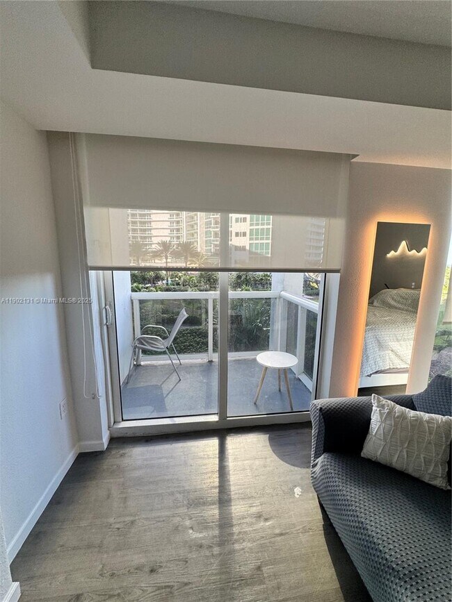 Building Photo - 10275 Collins Ave