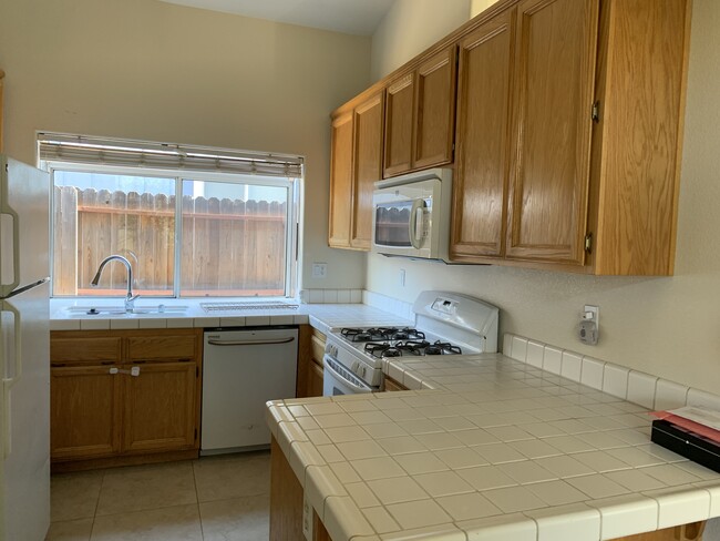 gas stove, microwave, dish washer, disposal - 2480 Julliard Cir