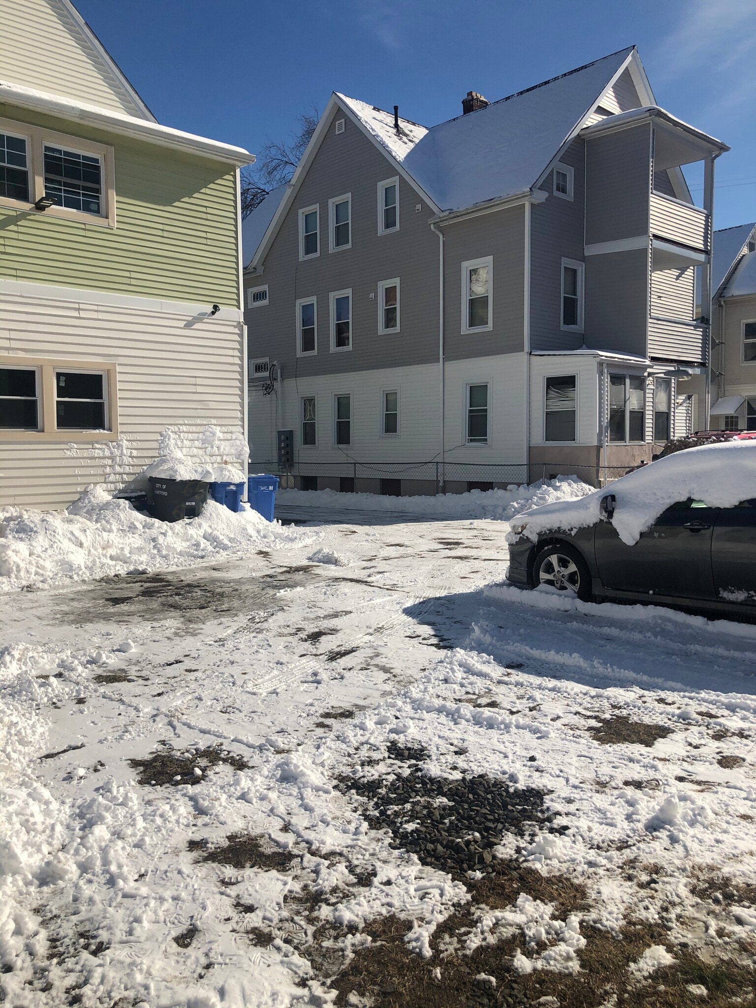 Fanced backyard and parking - 65 Rowe Ave
