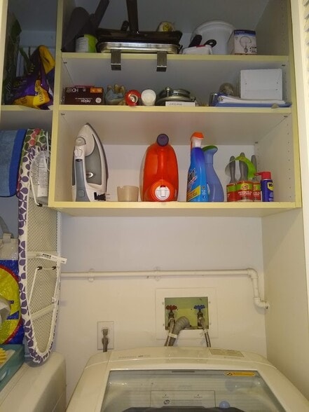 laundry closet with shelves - 1534 Amherst Ave