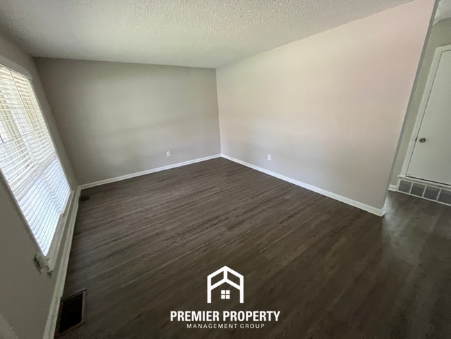 Building Photo - Spacious 4BR/2BA Home in 38118 | Hardwood Floors & Large Fenced Backyard