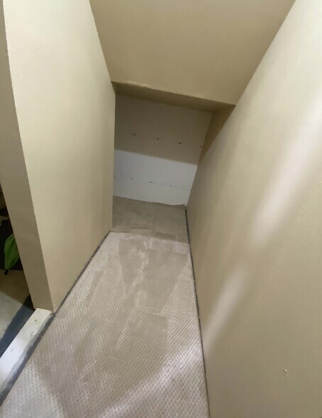 More storage space under the stairs - 610 Glen St