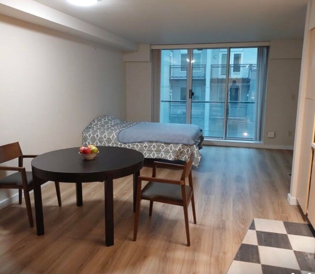 Building Photo - Downtown Bellevue Studio with Balcony, In-Unit Laundry & Amenities