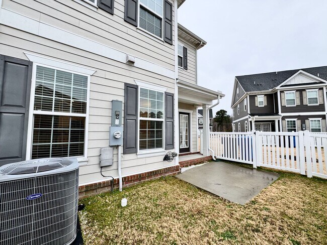 Building Photo - A 1st-Time Rental Available NOW! 3/3.5 Newer End-Unit Townhome w/Garage - Landscaping Included!