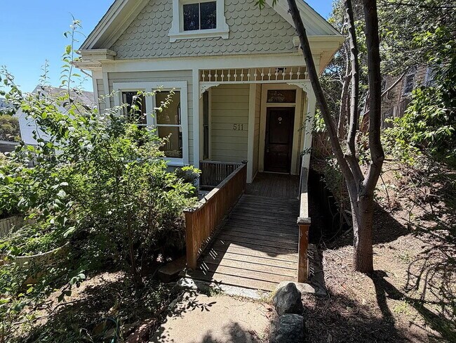 Building Photo - Freshly painted charming eccentric small Victorian house