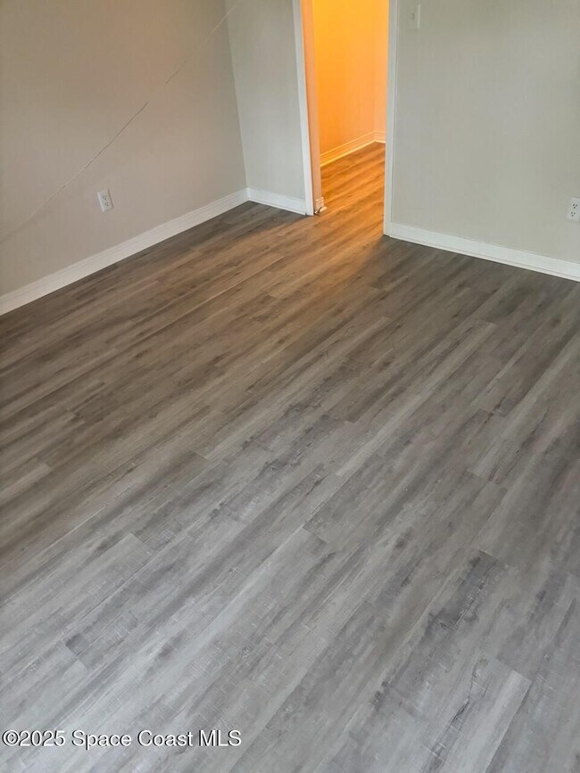 Building Photo - 7667 N Wickham Rd