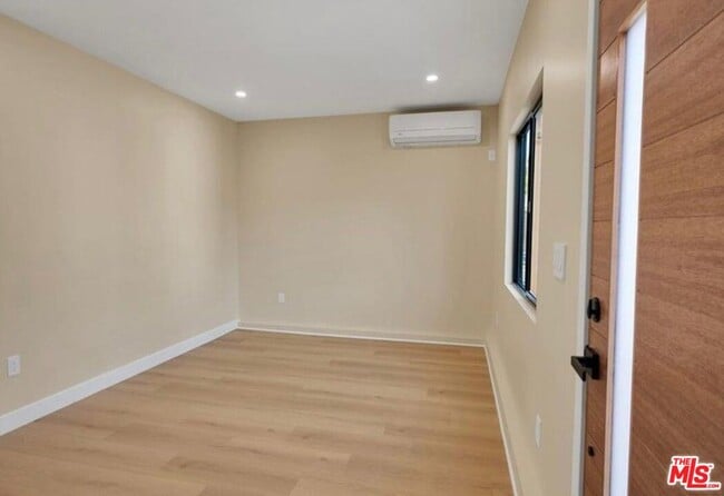 Building Photo - 10507 Dempsey Ave