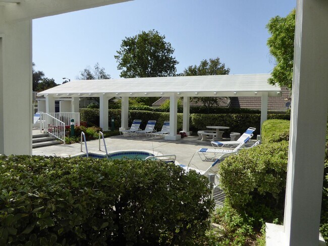Building Photo - COMING SOON! Charming 2-Bedroom Home with a Versatile Loft in The Bungalows of Valencia!