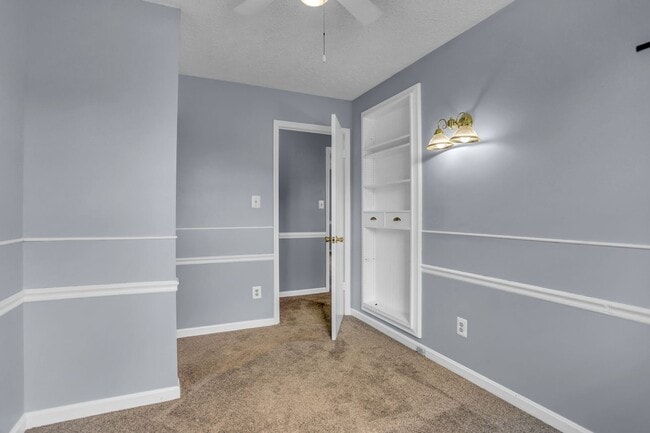 Building Photo - Spacious 4-Level Home with Deck, Workshop ...