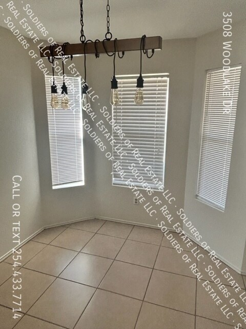 Building Photo - 3508 Woodlake Dr