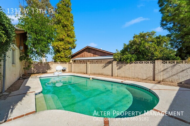 Building Photo - 1317 W 13th Pl