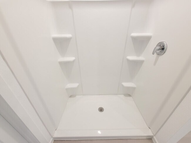 Building Photo - This great new single-story design makes smart use of the space available. At the front are all t...