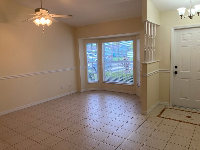 Living room with bay window sitting area - 3224 SW 7th Pl