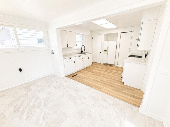 Building Photo - Lima Home – 3-Car Garage & Functional Layout