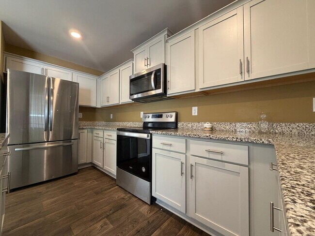 Building Photo - "Charming 3-Bed Oasis on Finnigan Rd: Spacious 1,994 Sq Ft with Granite Kitchen & Cozy Fireplace!"
