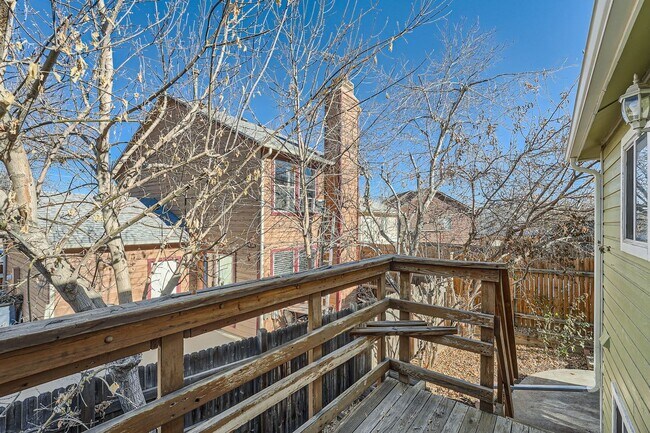 Building Photo - Spacious 2-Bed Townhome with Private Yard & 2-Car Garage in Aurora