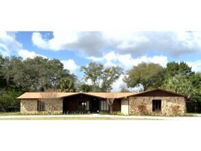 Building Photo - Large 4 Bedroom with NEW Flooring, Oversized Lot