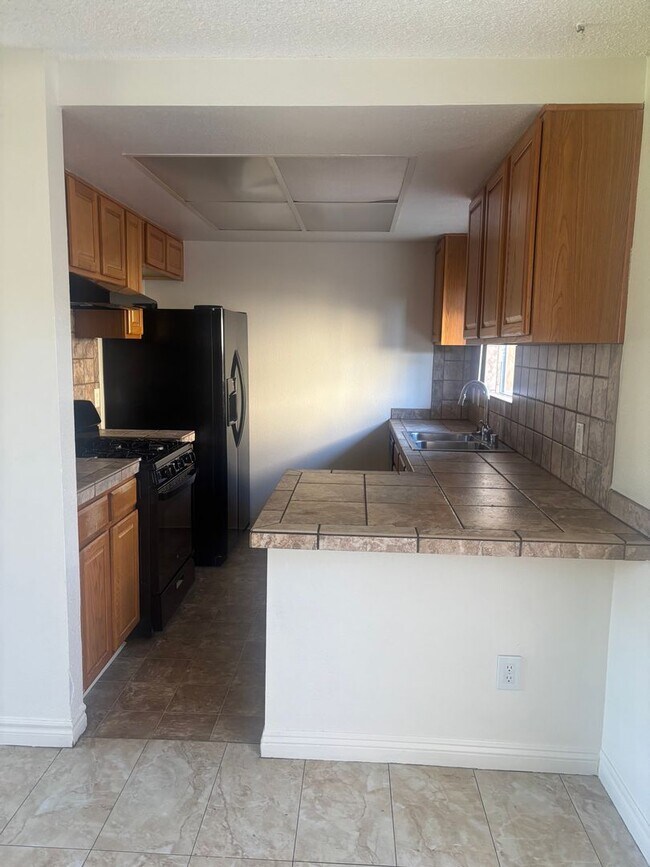 Building Photo - 2 Bedroom, 1.5 Bathroom Condo in El Cajon