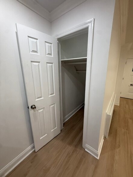 Generous closet with built-in shelving & hanging space - 1120 50th St