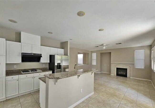 Building Photo - GATED SUMMERLIN HOME | 5 BEDROOM + DOWNSTAIRS DEN | 3-CAR GARAGE