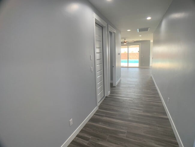Building Photo - 3 Bedroom - 2 Bath Pool Home