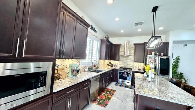 Building Photo - 3927 S Hollyhock Pl