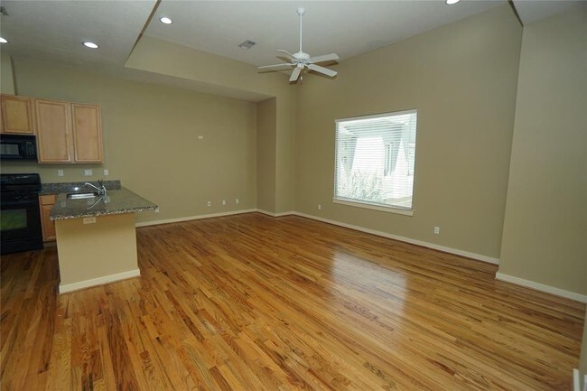 Building Photo - Elegant Gated Townhome Offering Unparallel...