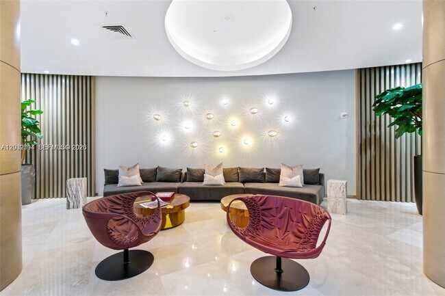 Building Photo - 10275 Collins Ave