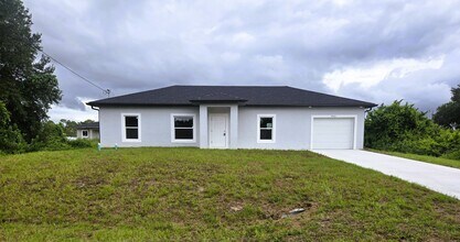 Building Photo - BRAND NEW 3/2/1 -SW LEHIGH ACRES FL