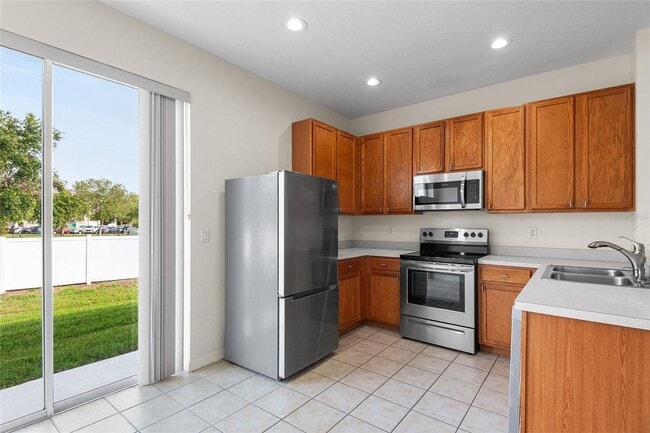 Building Photo - WESTCHASE TOWNHOME AVAILABLE!